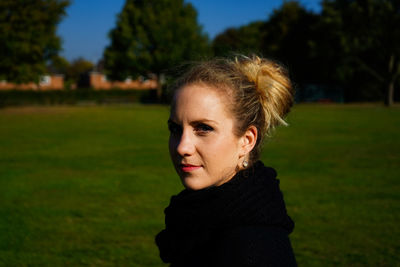 Portrait of smiling young woman outdoors