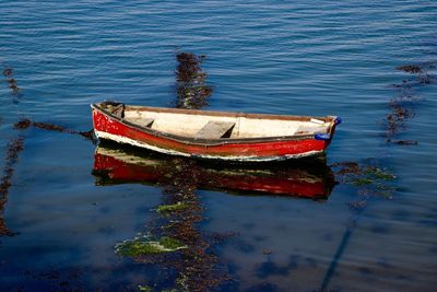 High angle view of boat moored in lake