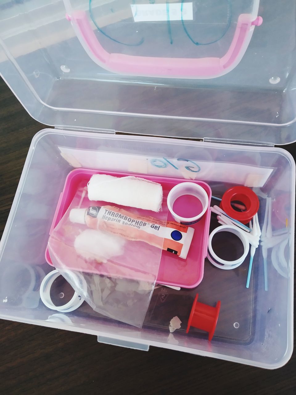 HIGH ANGLE VIEW OF PLASTIC CONTAINER