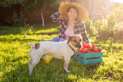 Portrait of dog on field