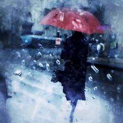 Close-up of woman in rain