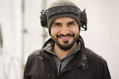 Portrait of happy male construction worker