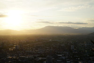 High angle view of city during sunset