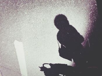 Shadow of man on wall