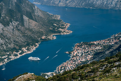 High angle view of buildings by sea