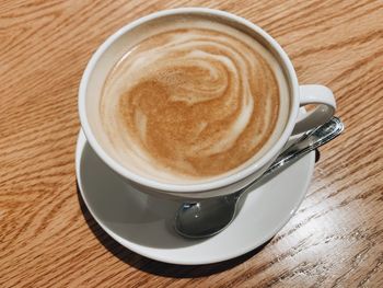 High angle view of cappuccino on table