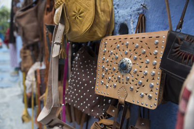 Purses hanging for sale at market