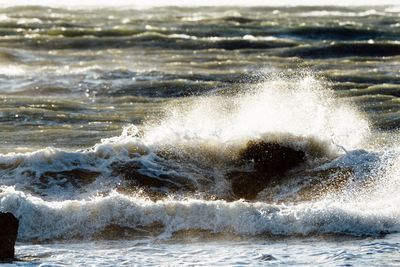 Sea waves splashing on beach