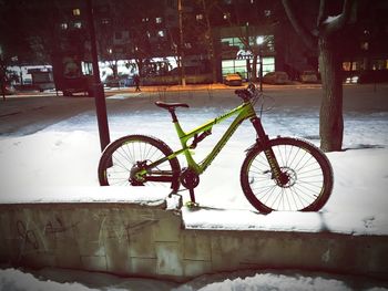 Bicycle on snow in city