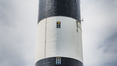 Low angle view of lighthouse against sky