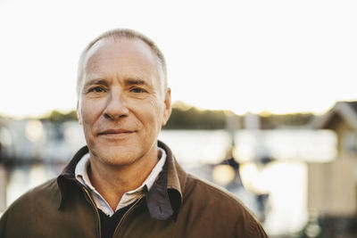 Portrait of confident senior man outdoors