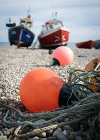 Close-up of fishing net on beach