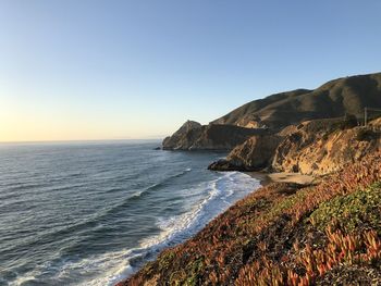 Scenic view of sea against clear sky