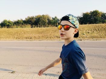 Side view of boy wearing sunglasses