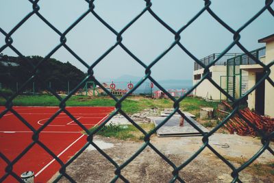 Chainlink fence against sky