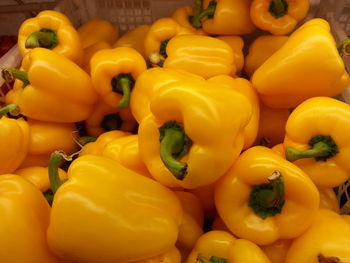 Close-up of yellow bell peppers for sale in market