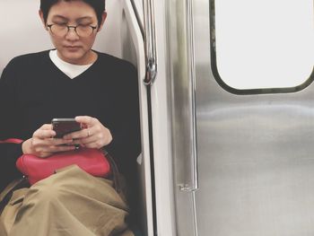 Young man using mobile phone