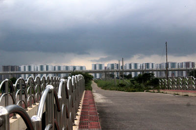 View of city against cloudy sky