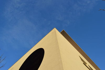 Low angle view of built structure against blue sky