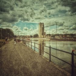 View of river against cloudy sky