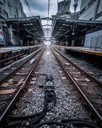 Railroad tracks amidst train