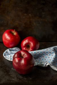 Close-up of apples on table