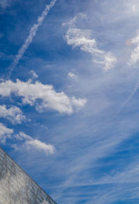 Low angle view of building against blue sky