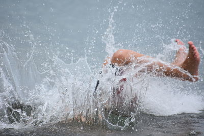 Man swimming in pool