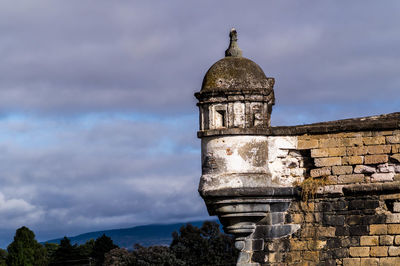 Low angle view of old building against sky