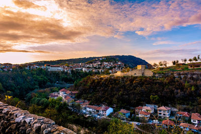 High angle view of townscape against sky at sunset