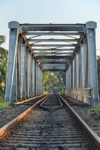 Surface level of railroad tracks against clear sky