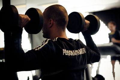 Man exercising in gym