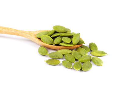 Close-up of green beans against white background