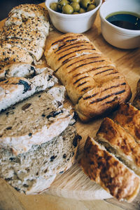 Close-up of various breads on table