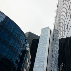 Low angle view of skyscrapers against sky