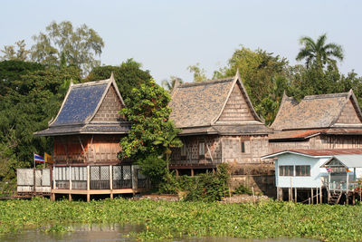 House with trees in background