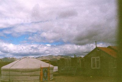 Built structure against cloudy sky