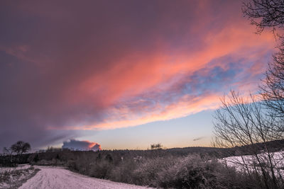 Scenic view of landscape against sky during sunset