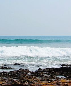 Scenic view of sea against clear sky