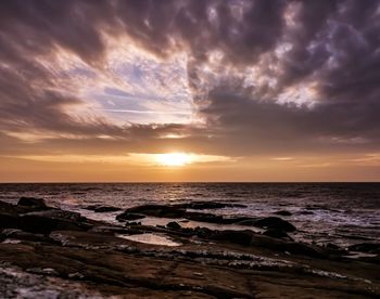 Scenic view of sea against sky during sunset