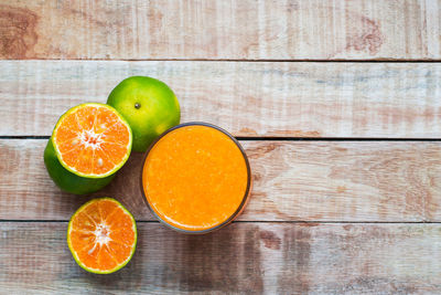 High angle view of orange fruit on table