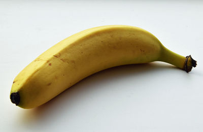 High angle view of bananas on white background