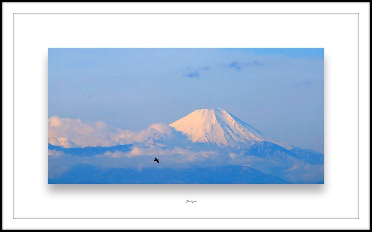 transfer print, auto post production filter, flying, sky, mountain, bird, beauty in nature, scenics, cloud - sky, low angle view, nature, tranquility, tranquil scene, animal themes, cloud, mid-air, wildlife, blue, weather, day