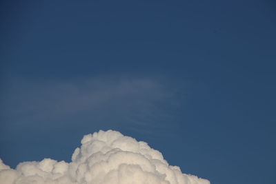 Low angle view of cloudscape against blue sky