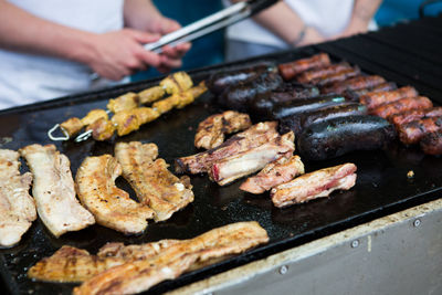 High angle view of churrasco being cooked on barbecue