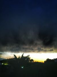Scenic view of landscape against cloudy sky