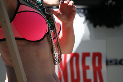 Midsection of woman in lingerie during gay pride parade