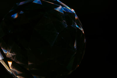 Close-up of glass against black background