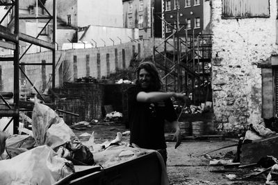 Woman standing in front of building