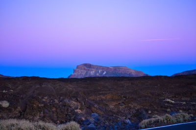 Scenic view of mountains against clear sky